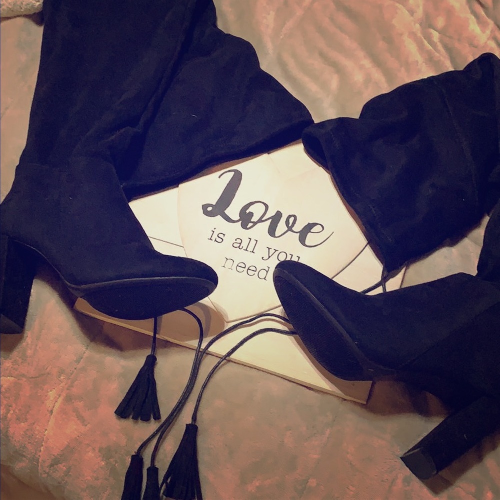 Thigh high black heel boots